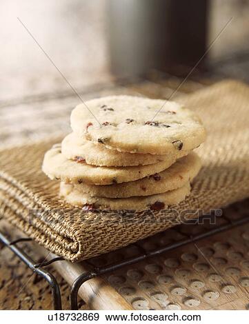Stock Photo - Stack of fruit shortbread biscuits, close-up. Fotosearch