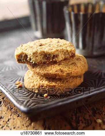 Stock Image - Stack of ginger cookies, close-up. Fotosearch
