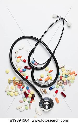 Picture - Stethoscope and pills. Fotosearch
