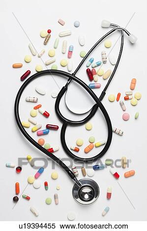Stethoscope and pills View Large Photo Image Stock Photography - Stethoscope and pills. Fotosearch