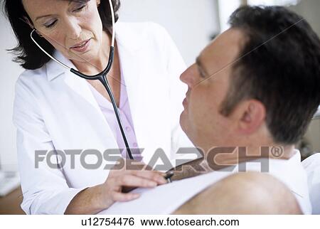 Stethoscope examination View Large Photo Image Stock Photograph - Stethoscope examination. Fotosearch
