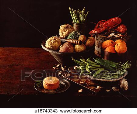 Stock Image - Still life of fresh lobster, fruit and vegetables. Fotosearch