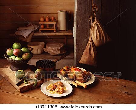 Still life of traditional country farm house scene, with cooking apples, roasted guinea fowl and baked apple turnovers View Large Photo Image Stock Photo - Still life of traditional country farm house scene, with cooking apples, roasted guinea fowl and baked apple turnovers. Fotosearch