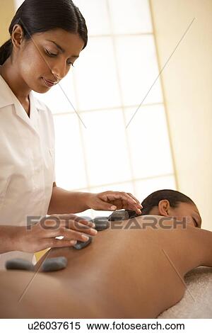 Stone therapy View Large Photo Image Stock Photography - Stone therapy. Fotosearch
