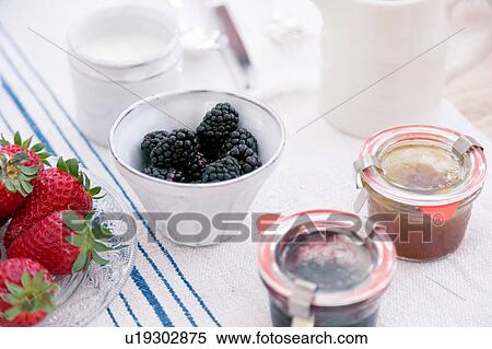 Summer fruits in bowls and preserves in jars on tablecloth View Large Photo Image Stock Photography - Summer fruits in bowls and preserves in jars on tablecloth. Fotosearch