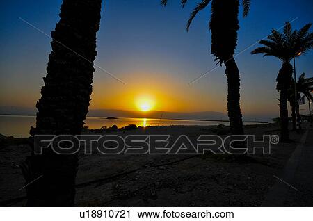 Stock Image - Sunrise over the Dead Sea, Israel. Fotosearch