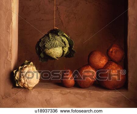 Stock Photograph - Swede, cauliflower and hanging cabbage. Fotosearch