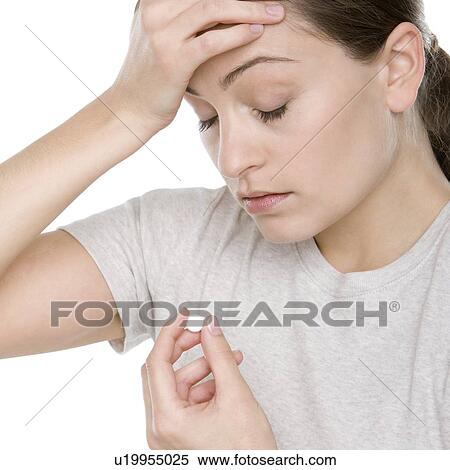 Taking a painkiller View Large Photo Image Stock Photography - Taking a painkiller. Fotosearch