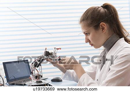 Technician soldering wires in lab View Large Photo Image Stock Photo - Technician soldering wires in lab. Fotosearch