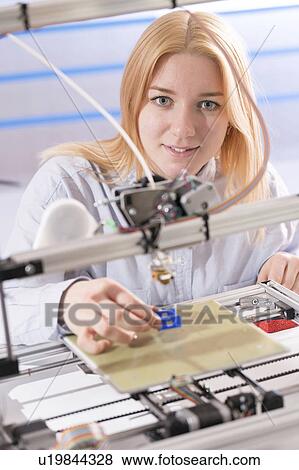 Technician using 3d printer View Large Photo Image Stock Photo - Technician using 3d printer. Fotosearch