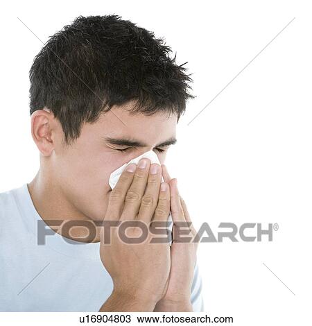 Teenage boy sneezing View Large Photo Image Stock Image - Teenage boy sneezing. Fotosearch