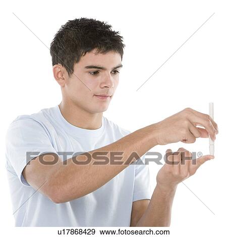 Testing blood glucose levels View Large Photo Image Stock Photo - Testing blood glucose levels. Fotosearch