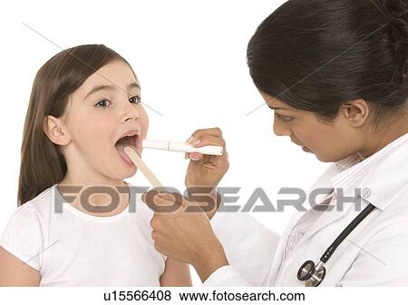 Throat examination View Large Photo Image Stock Photo - Throat examination. Fotosearch