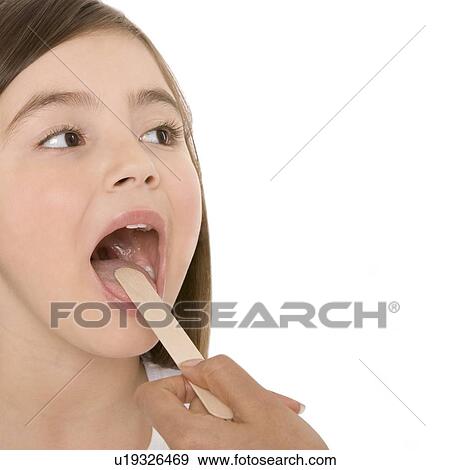 Throat examination View Large Photo Image Stock Photo - Throat examination. Fotosearch
