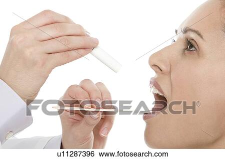 Stock Photograph - Throat examination. Fotosearch