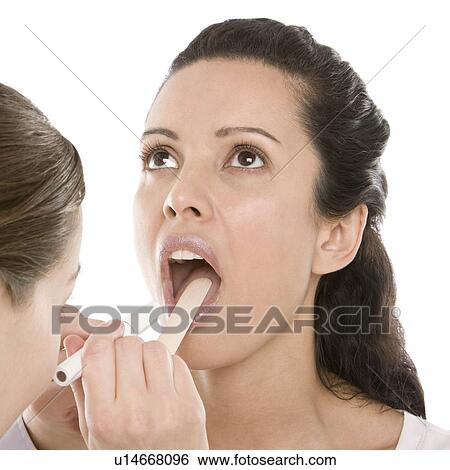 Throat examination View Large Photo Image Stock Photograph - Throat examination. Fotosearch