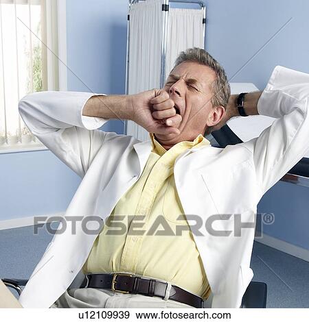 Stock Photo - Tired doctor. Fotosearch