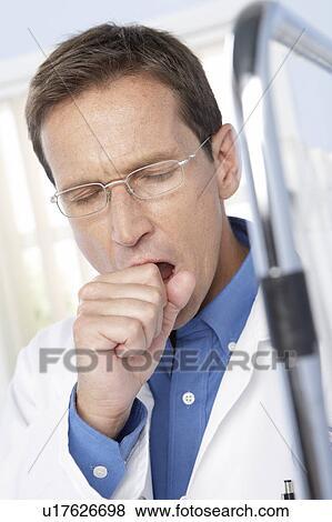 Tired doctor View Large Photo Image Stock Photo - Tired doctor. Fotosearch
