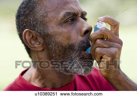 Treating an asthma attack View Large Photo Image Stock Image - Treating an asthma attack. Fotosearch