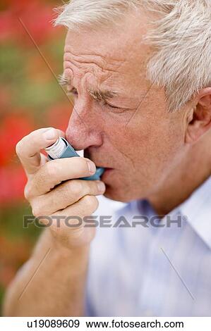 Treating an asthma attack View Large Photo Image Stock Photo - Treating an asthma attack. Fotosearch