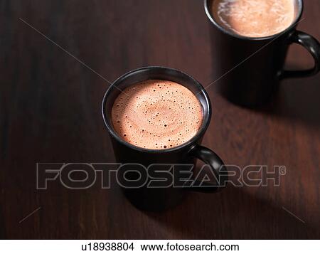 Two hot chocolate drinks View Large Photo Image Picture - Two hot chocolate drinks. Fotosearch