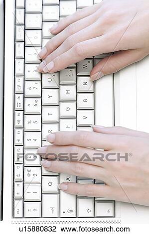 Stock Image - Typing on a laptop. Fotosearch