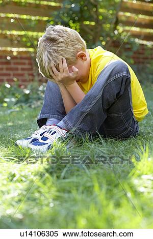 Stock Photography - Unhappy boy. Fotosearch