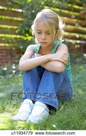 Unhappy girl View Large Photo Image Stock Photo - Unhappy girl. Fotosearch