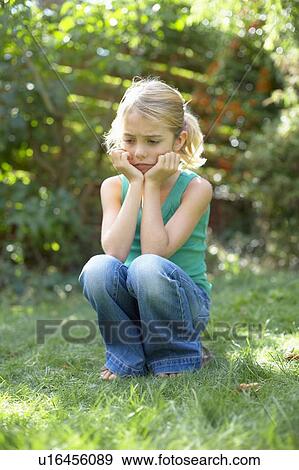 Unhappy girl View Large Photo Image Stock Photo - Unhappy girl. Fotosearch