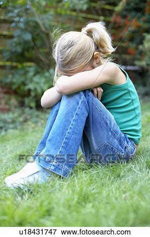 Stock Photo - Unhappy girl. Fotosearch