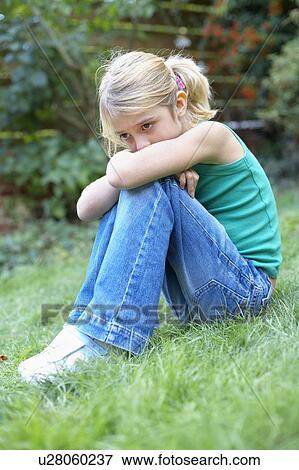 Stock Photo - Unhappy girl. Fotosearch