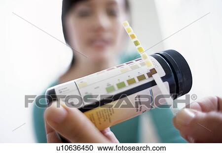 Stock Image - Urine analysis. Fotosearch