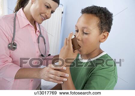 Using asthma inhaler View Large Photo Image Stock Photo - Using asthma inhaler. Fotosearch