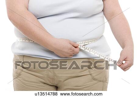 Stock Photo - Waist measurement. Fotosearch