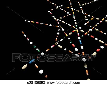 Stock Image - Web of pills. Fotosearch