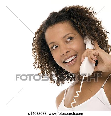 Stock Photo - Woman chatting on a phone. Fotosearch