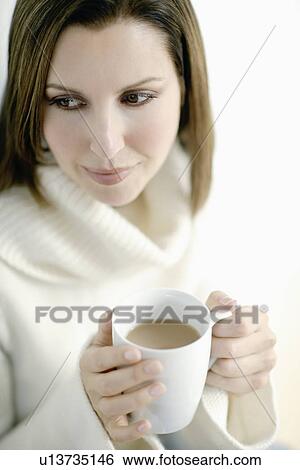 Stock Photograph - Woman drinking tea. Fotosearch