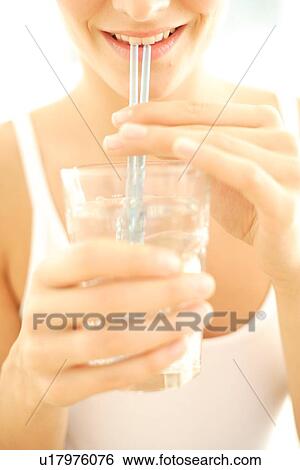 Stock Photograph - Woman drinking water. Fotosearch