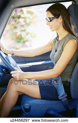 Woman driving View Large Photo Image Stock Photo - Woman driving. Fotosearch