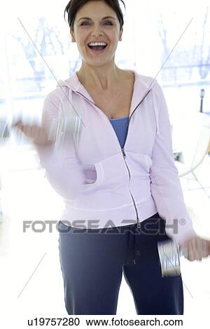 Stock Image - Woman exercising. Fotosearch