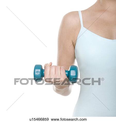 Stock Photo - Woman lifting weights. Fotosearch