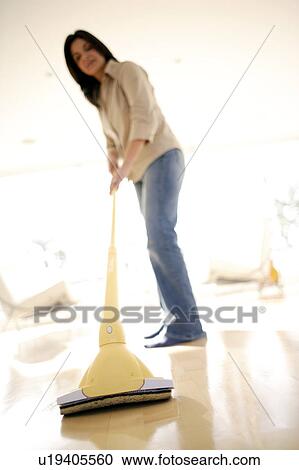 Woman mopping View Large Photo Image Stock Image - Woman mopping. Fotosearch