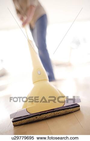 Woman mopping View Large Photo Image Stock Photography - Woman mopping. Fotosearch