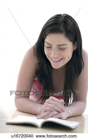 Stock Image - Woman reading. Fotosearch