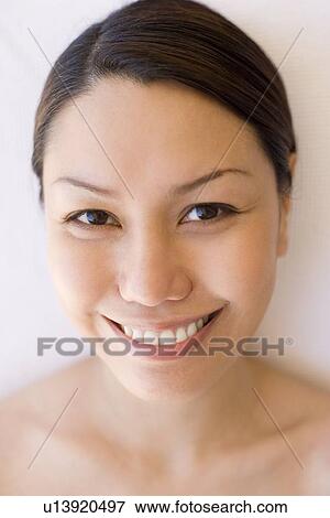 Stock Photo - Woman relaxing at a spa. Fotosearch