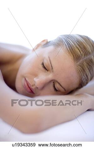 Woman relaxing at a spa View Large Photo Image Stock Photo - Woman relaxing at a spa. Fotosearch