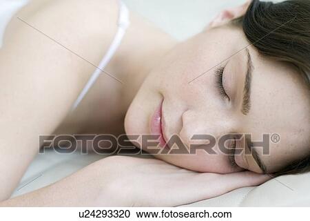 Stock Image - Woman sleeping. Fotosearch