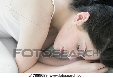 Stock Photo - Woman sleeping. Fotosearch