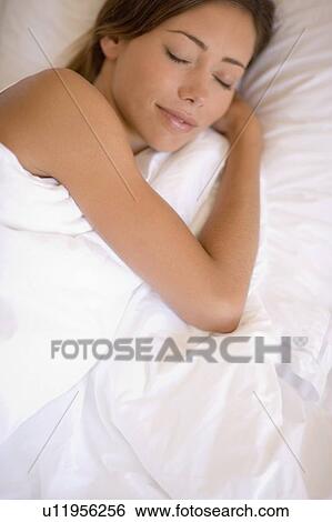 Stock Photograph - Woman sleeping. Fotosearch