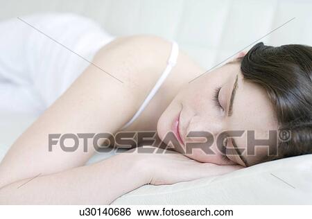 Woman sleeping View Large Photo Image Stock Photograph - Woman sleeping. Fotosearch